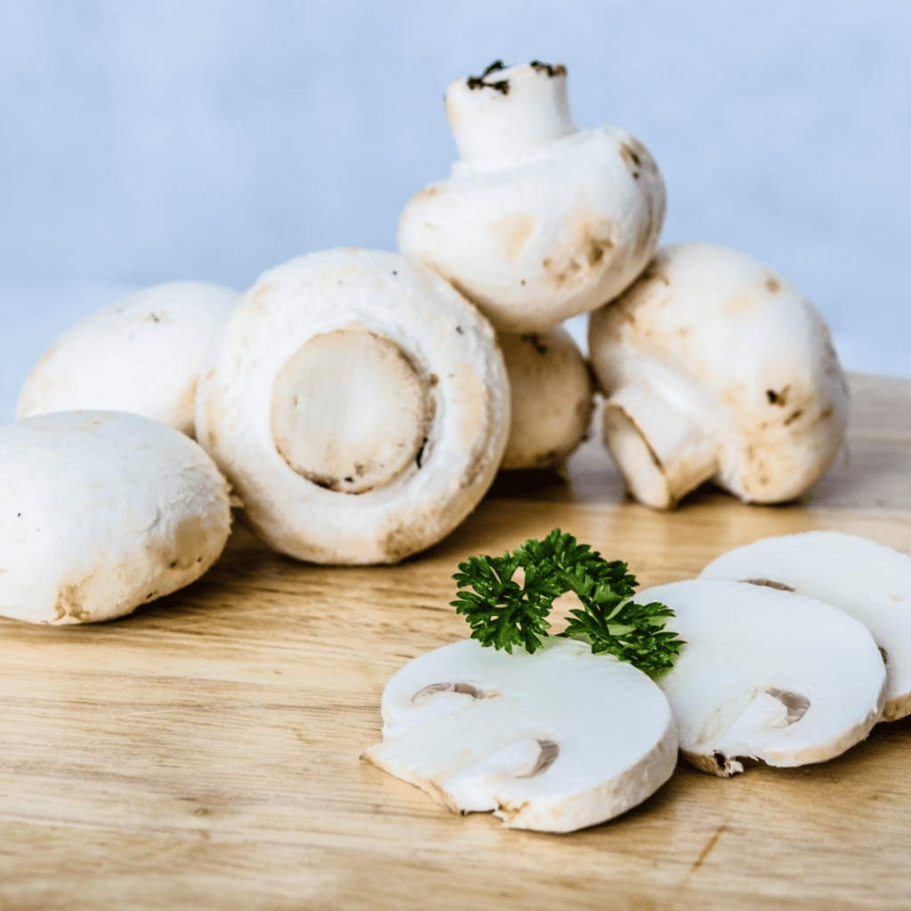 Fresh organic mushrooms being prepared to eat.