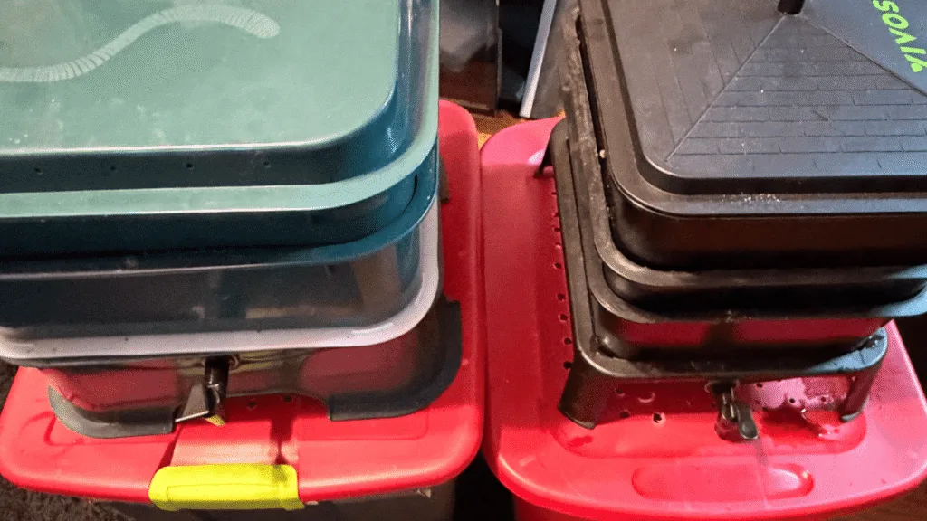 Four worm bins two stackable worm towers and two DIY-style worm bins.
